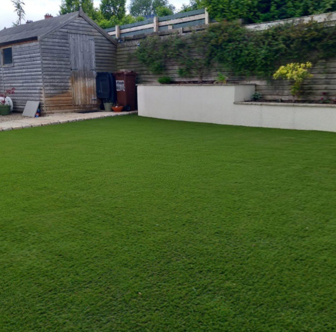 Artificial grass installation in a garden
